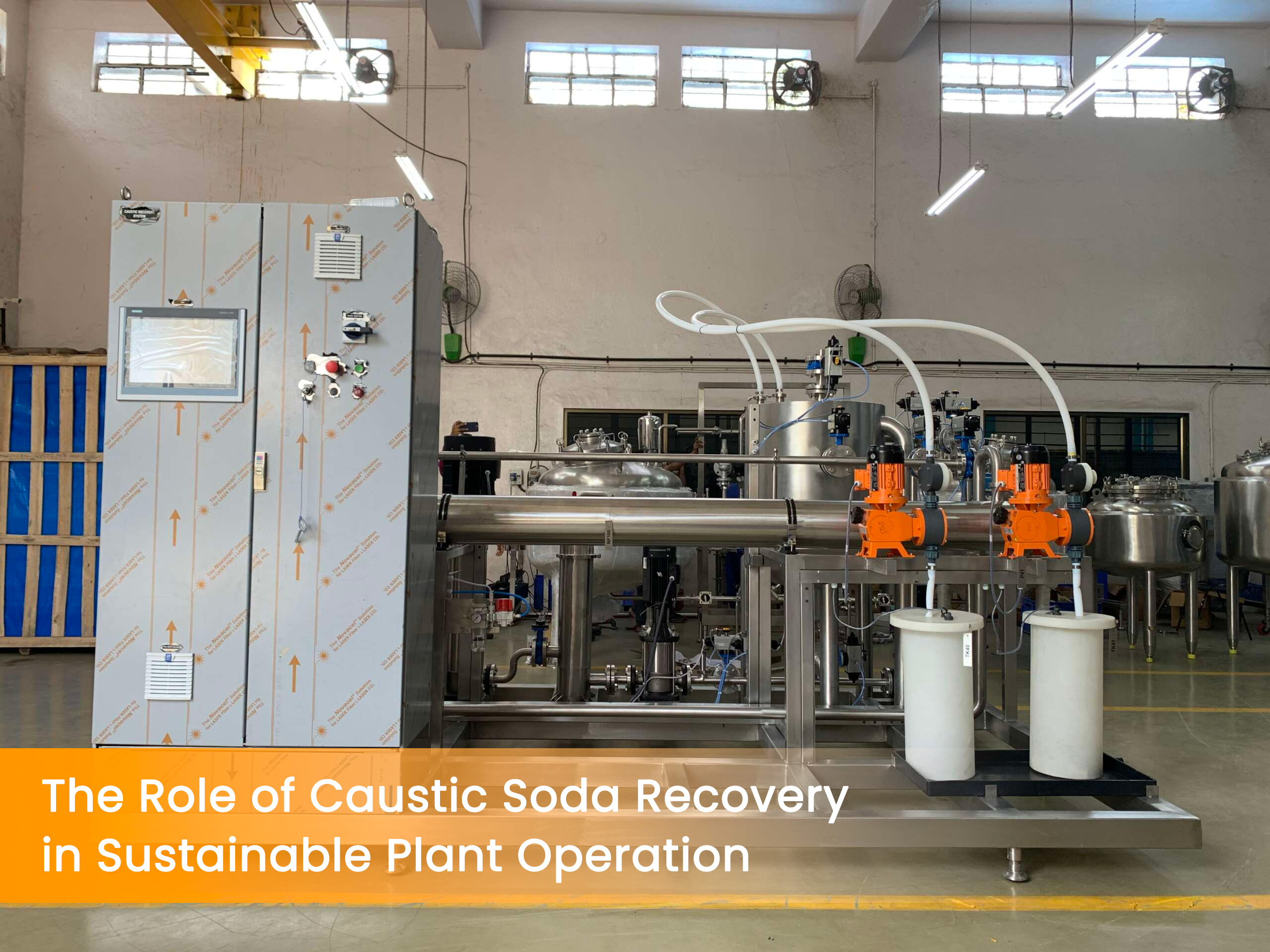 Industrial caustic soda recovery system setup inside a plant with tanks, pumps, and control panel for sustainable operation