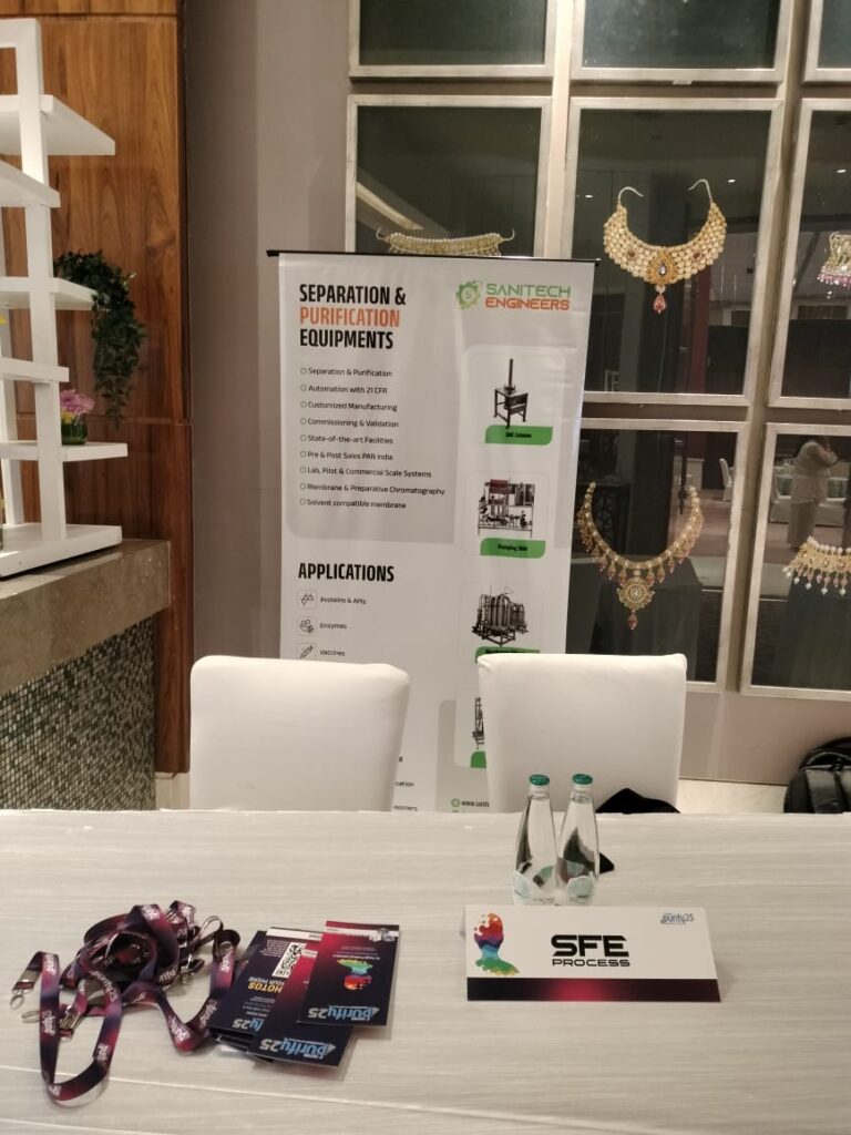 Sanitech Engineers standee on a stall table listing separation and purification equipment and applications